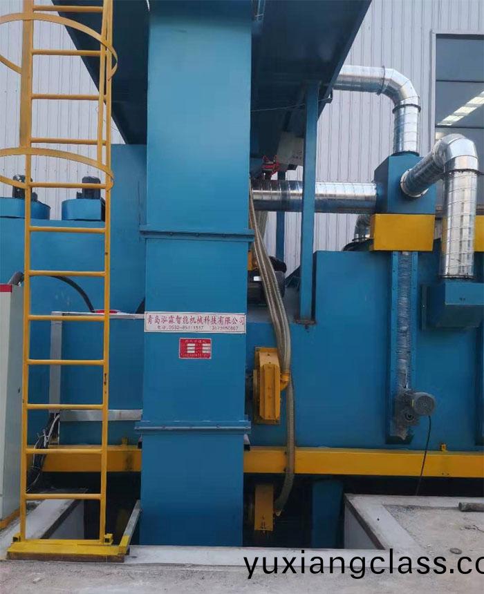 通過(guo)箱(xiang)式(shi)抛丸機(ji)